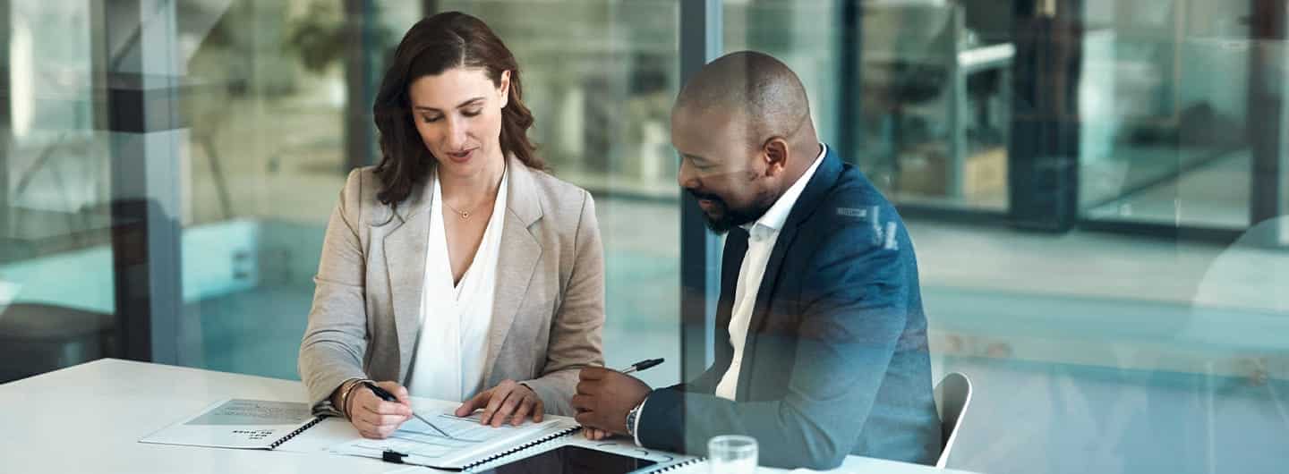 Office, meeting and documents of business people, clients or team for commercial real estate.