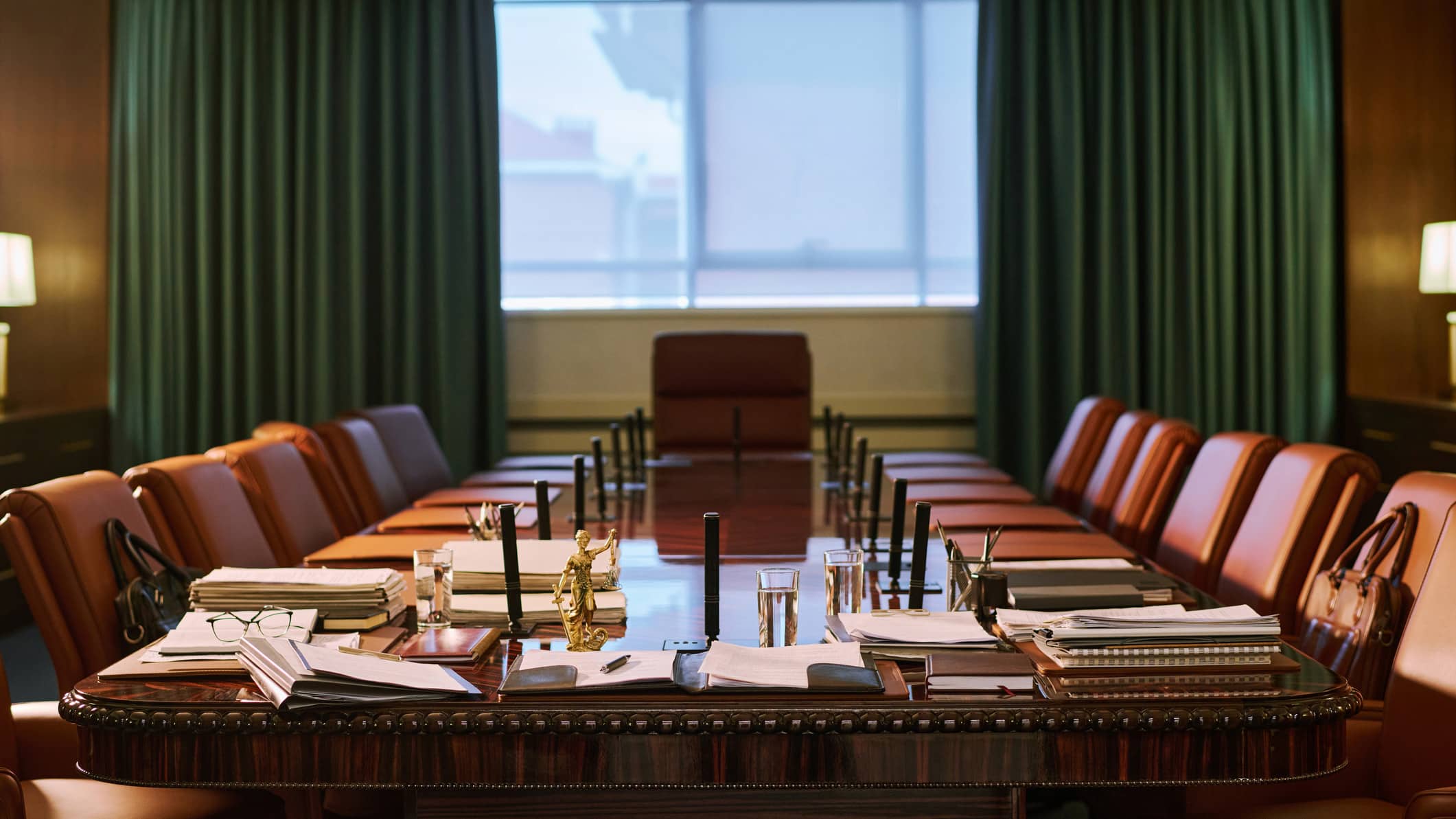 A large conference room suited for law firm corporate performance meetings, with table and chairs.