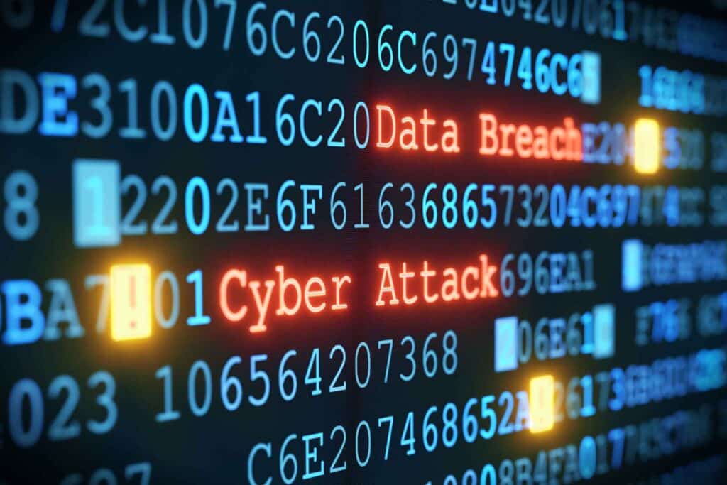 Computer screen with code, Data Breach and Cyber Attack flagged by data breach consultants.