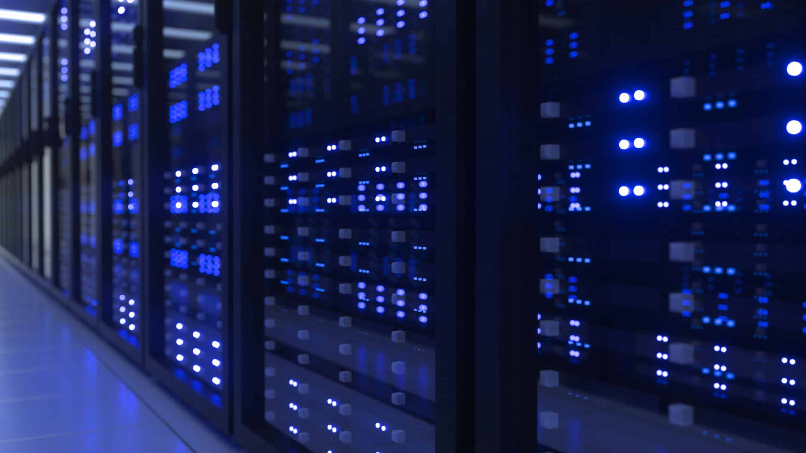 Rows of server racks with blue LED lights, powering Natural Language Processing for legal documents.