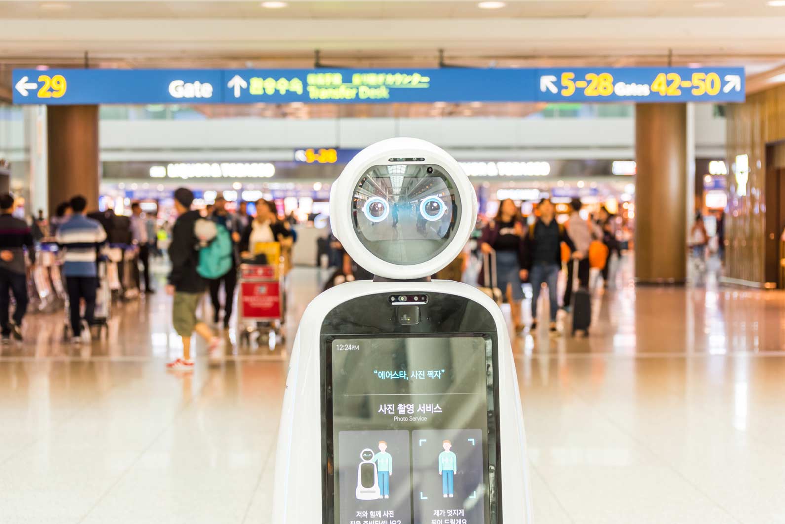 An AI-powered virtual assistant helps travelers as people walk through the airport background.