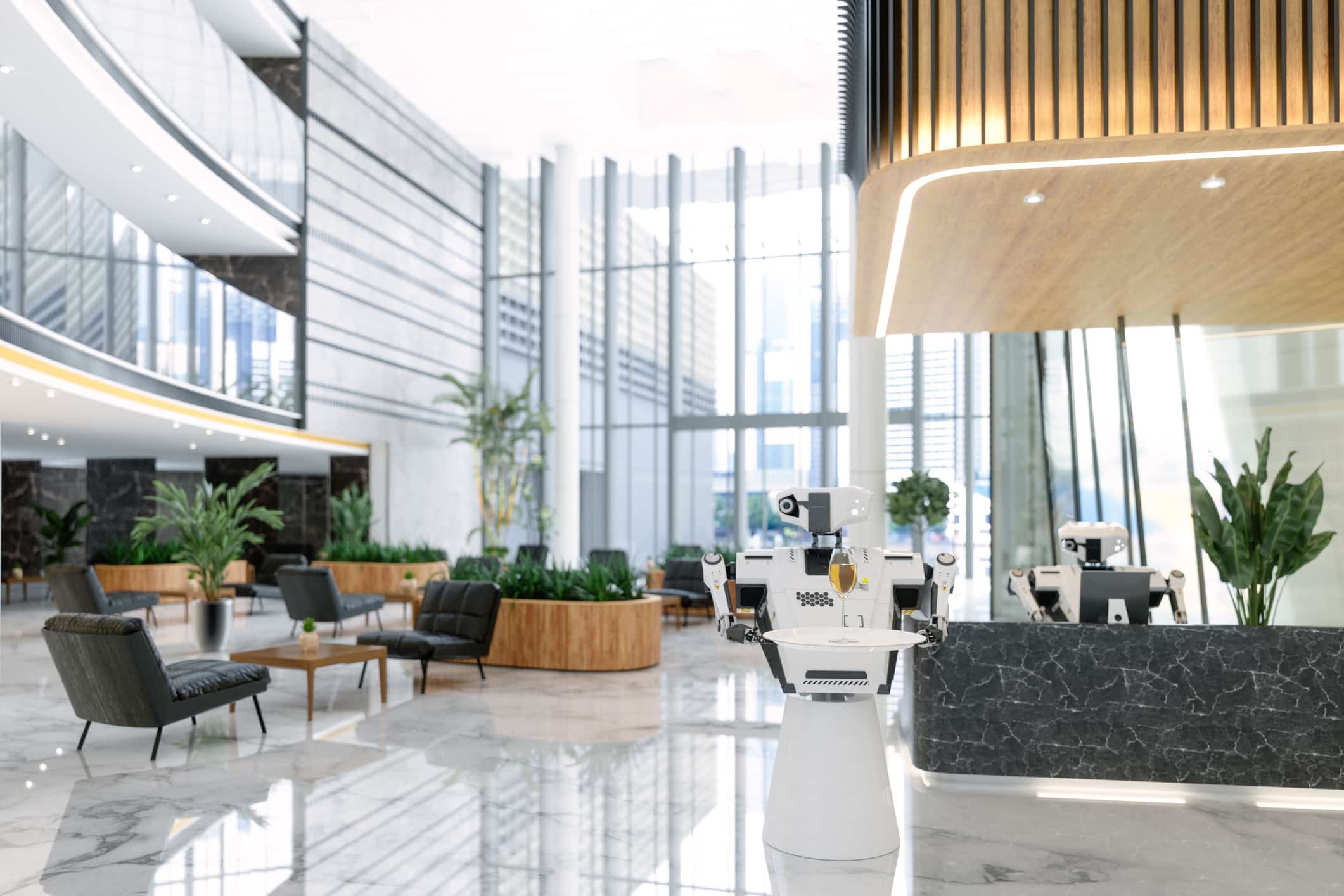 Modern office lobby with hospitality AI-powered virtual assistants at reception and lounge area.
