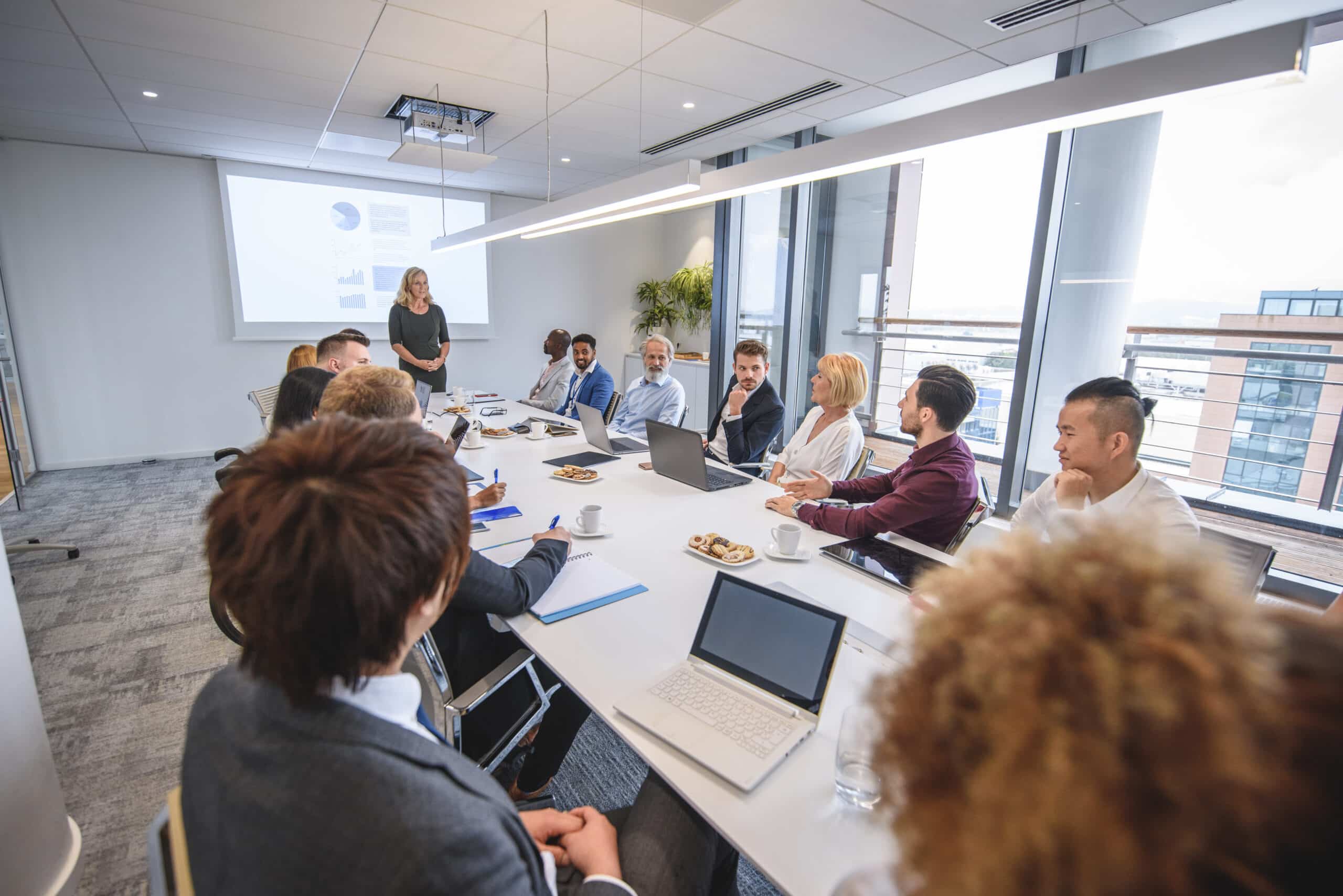 Business professionals meeting to discuss expert witness services and consulting solutions.