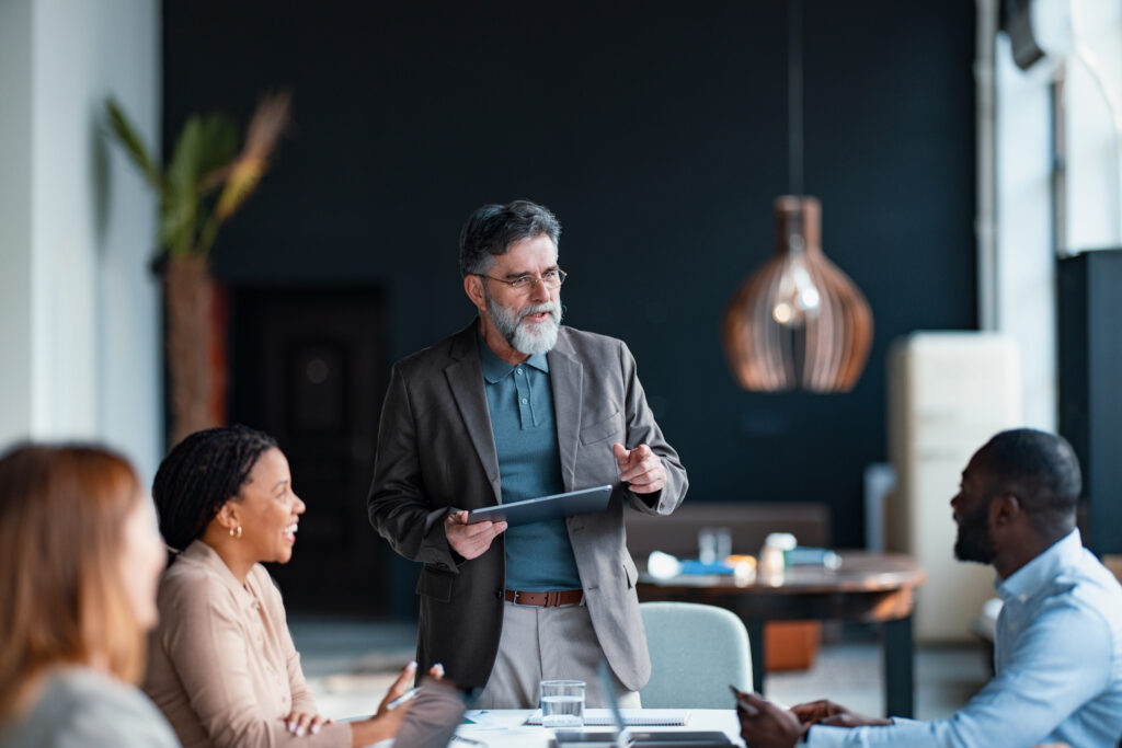 Business Professional Leading a commercial real estate asset management consulting Meeting