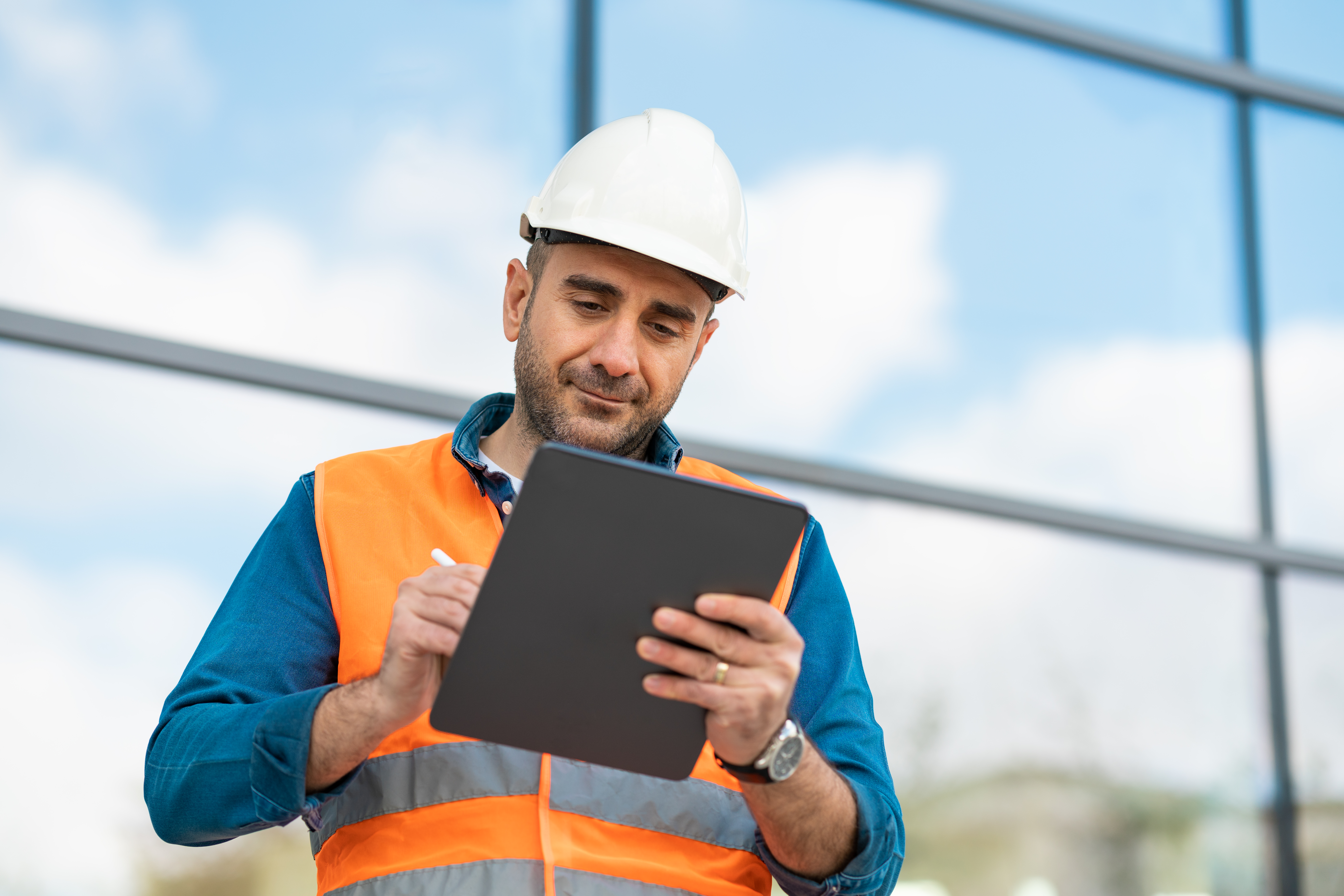 Male engineer checking job symbolizing commercial real estate due dilligence consulting