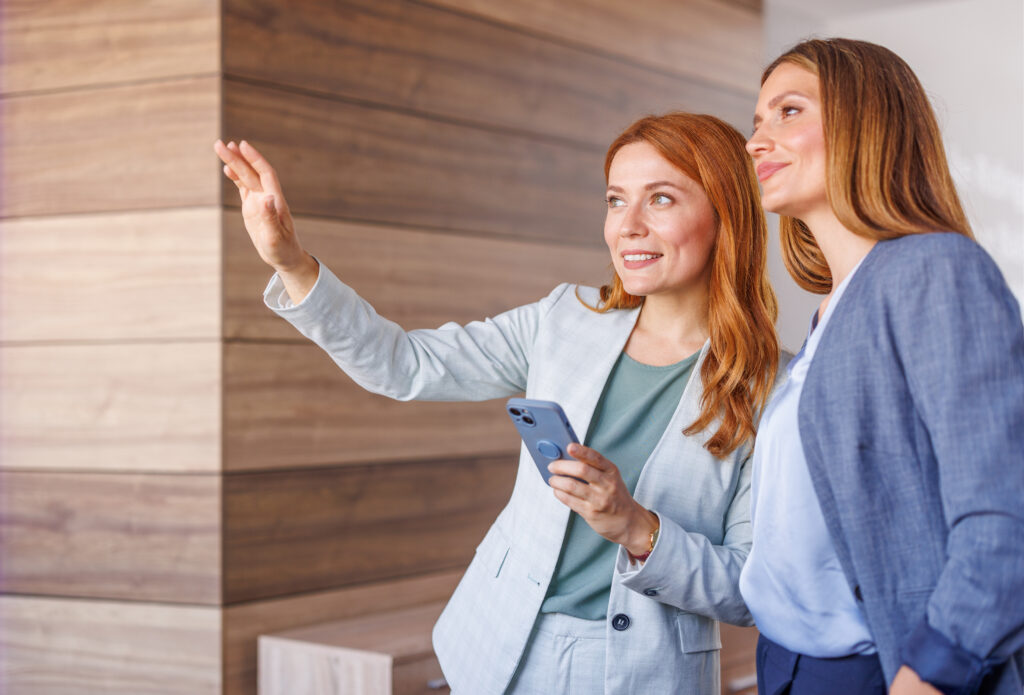 Two female commercial real estate portfolio management consultants