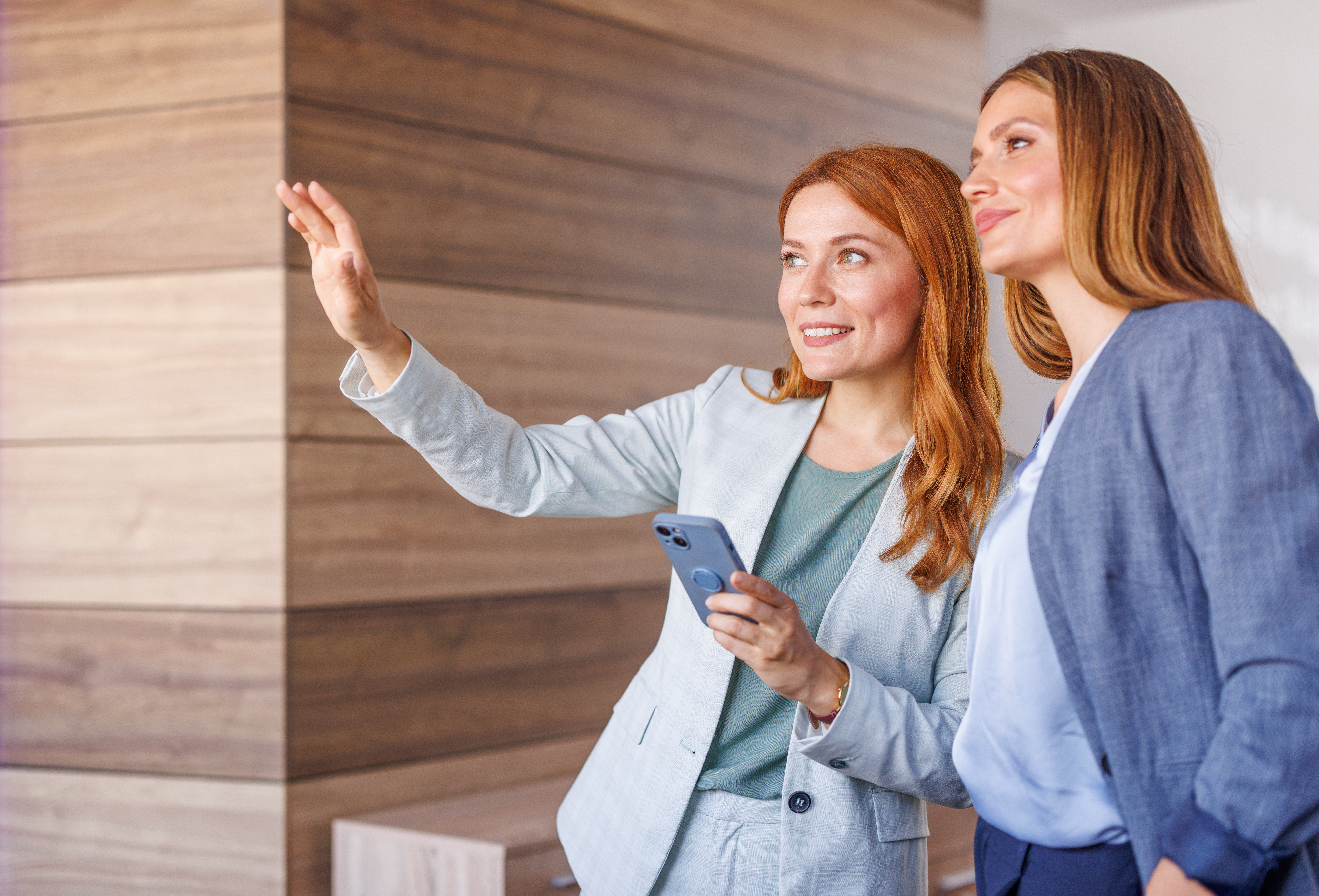 Two female commercial real estate portfolio management consultants