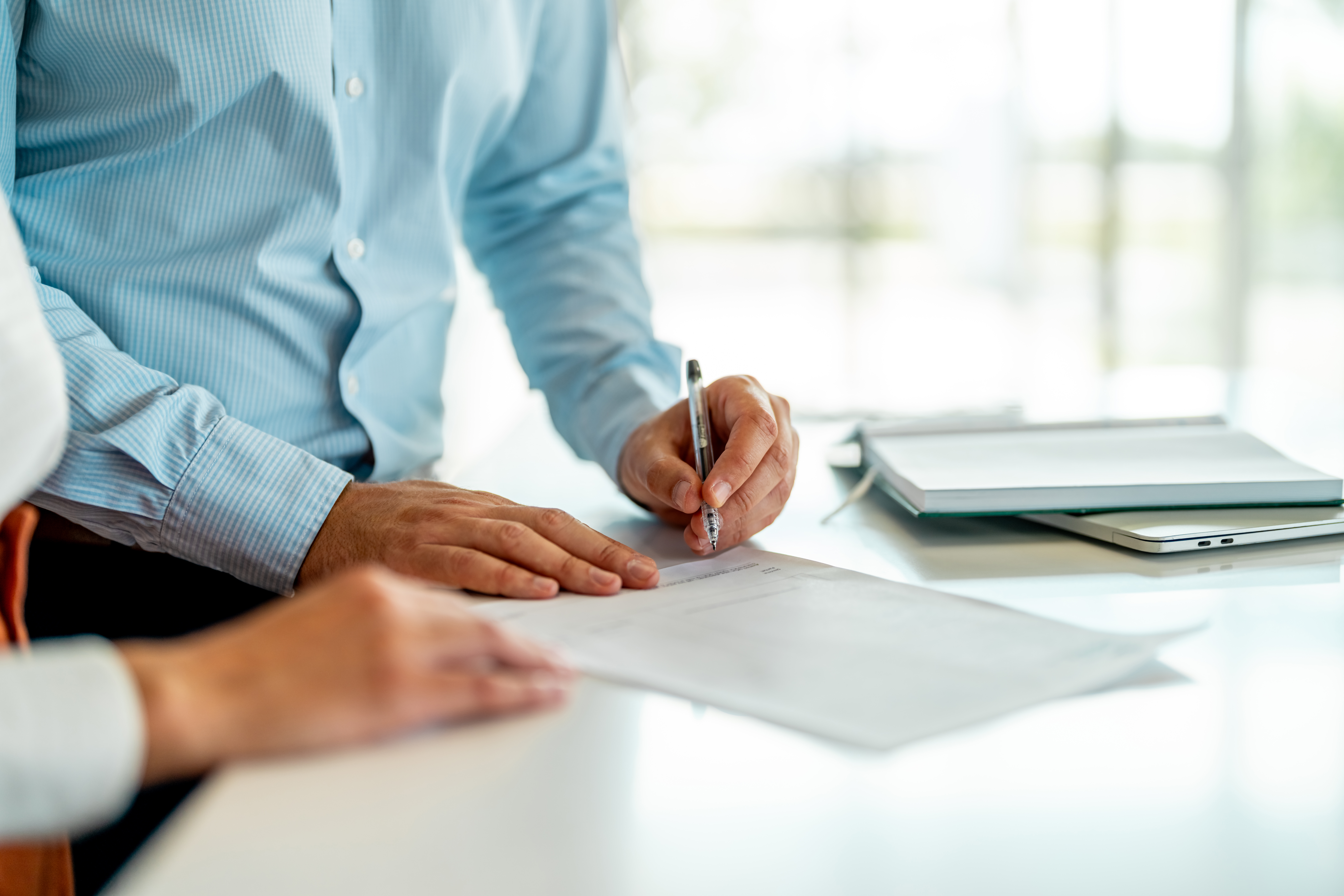 Business people working on commercial real estate transaction management consulting