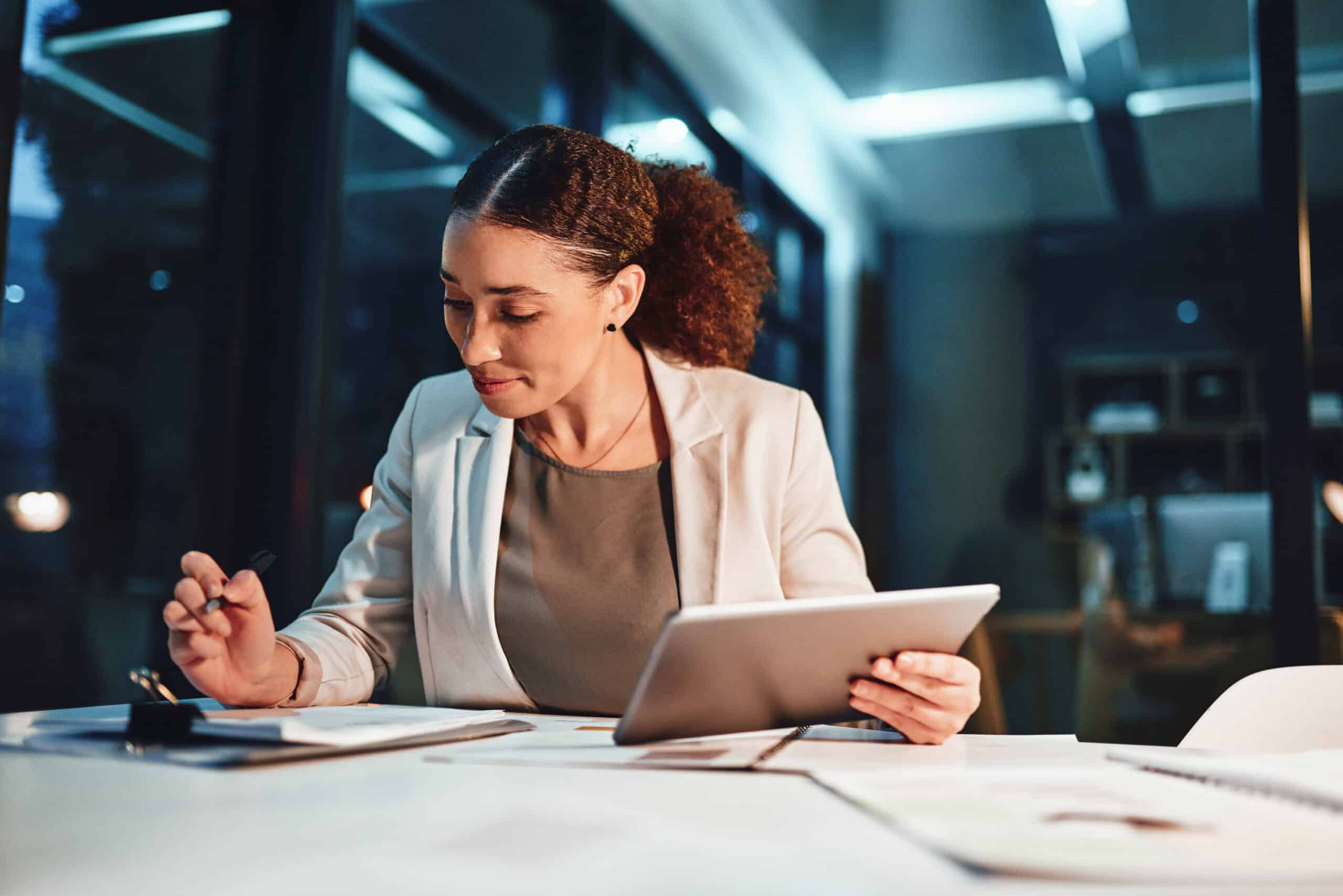 Cropped shot of a young attractive businesswoman working late at the office
