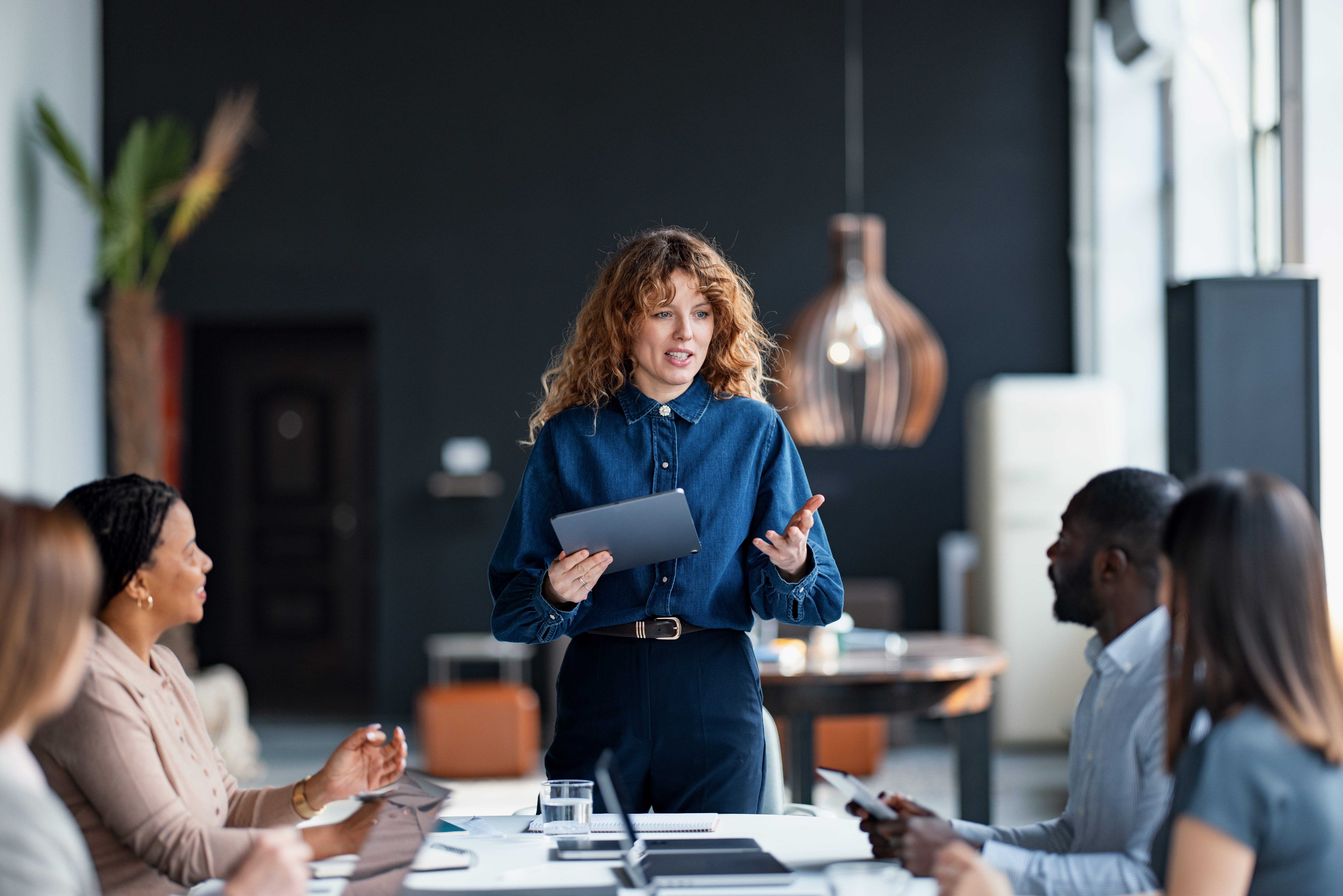 Business Professional Leading Team Presentation about Leadership development consulting