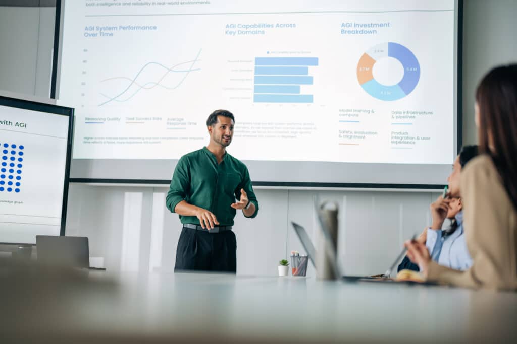Businessman Presenting AGI Analytics representing AI strategy consulting