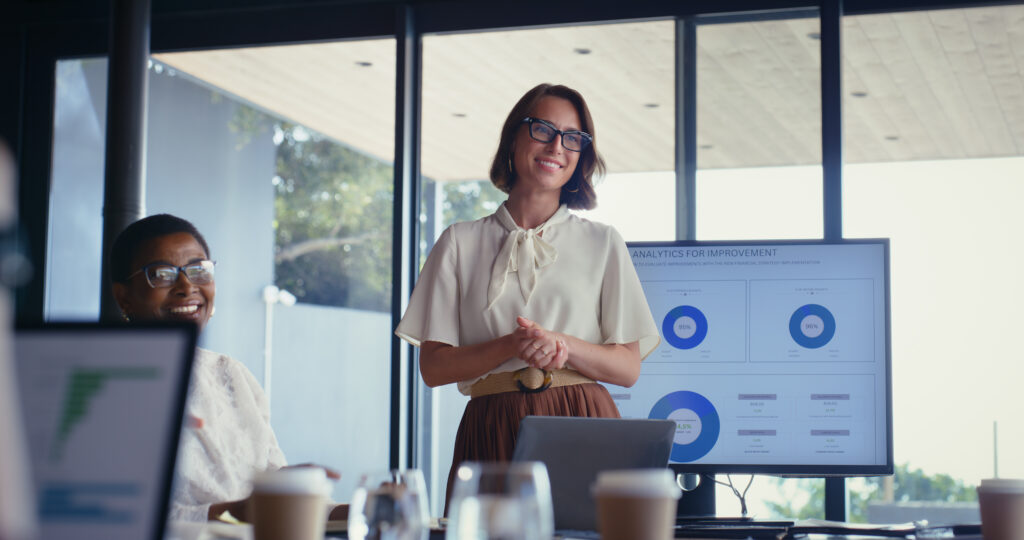 Businesswoman gives presentation representing customer data platform consulting