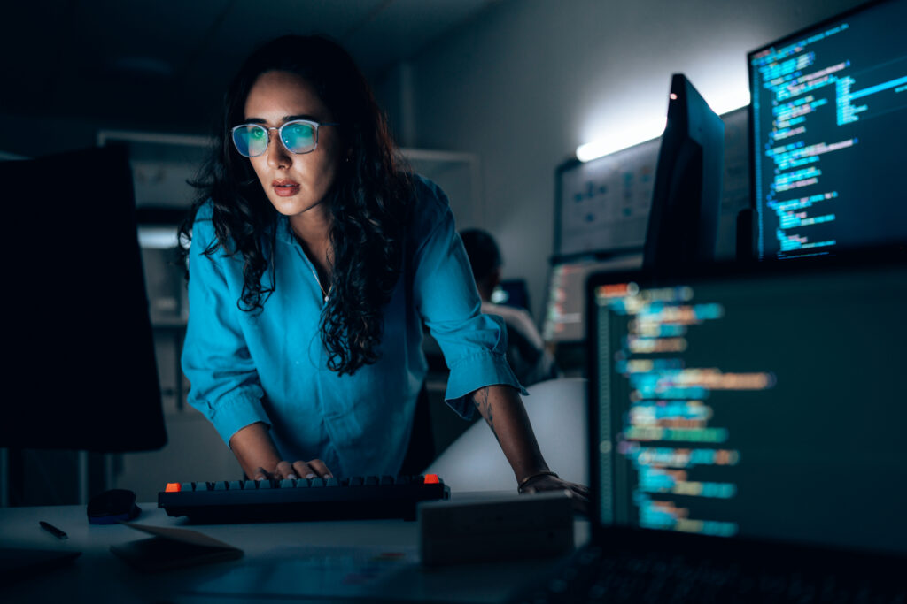 Female software developer coding representing data enginerring consulting