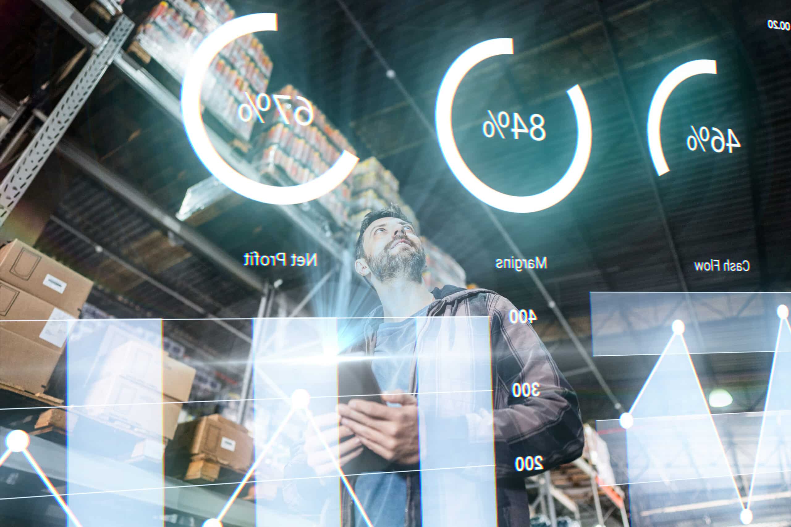 Mature man analyzing virtual data representing devices & hardware consulting