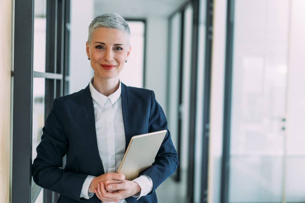 Businesswoman in modern office representing employee experience consulting
