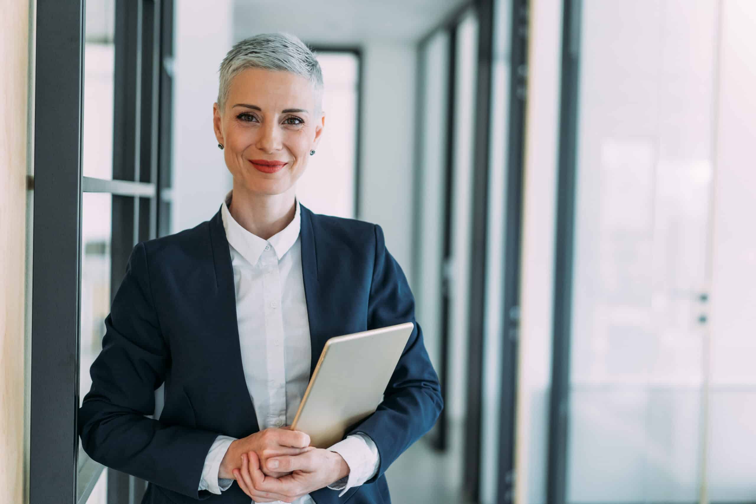 Businesswoman in modern office representing employee experience consulting