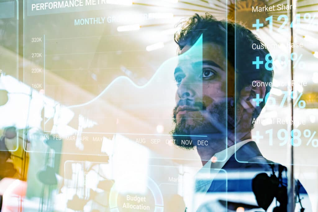 Businessman analyzing business data representing revenue strategy consulting