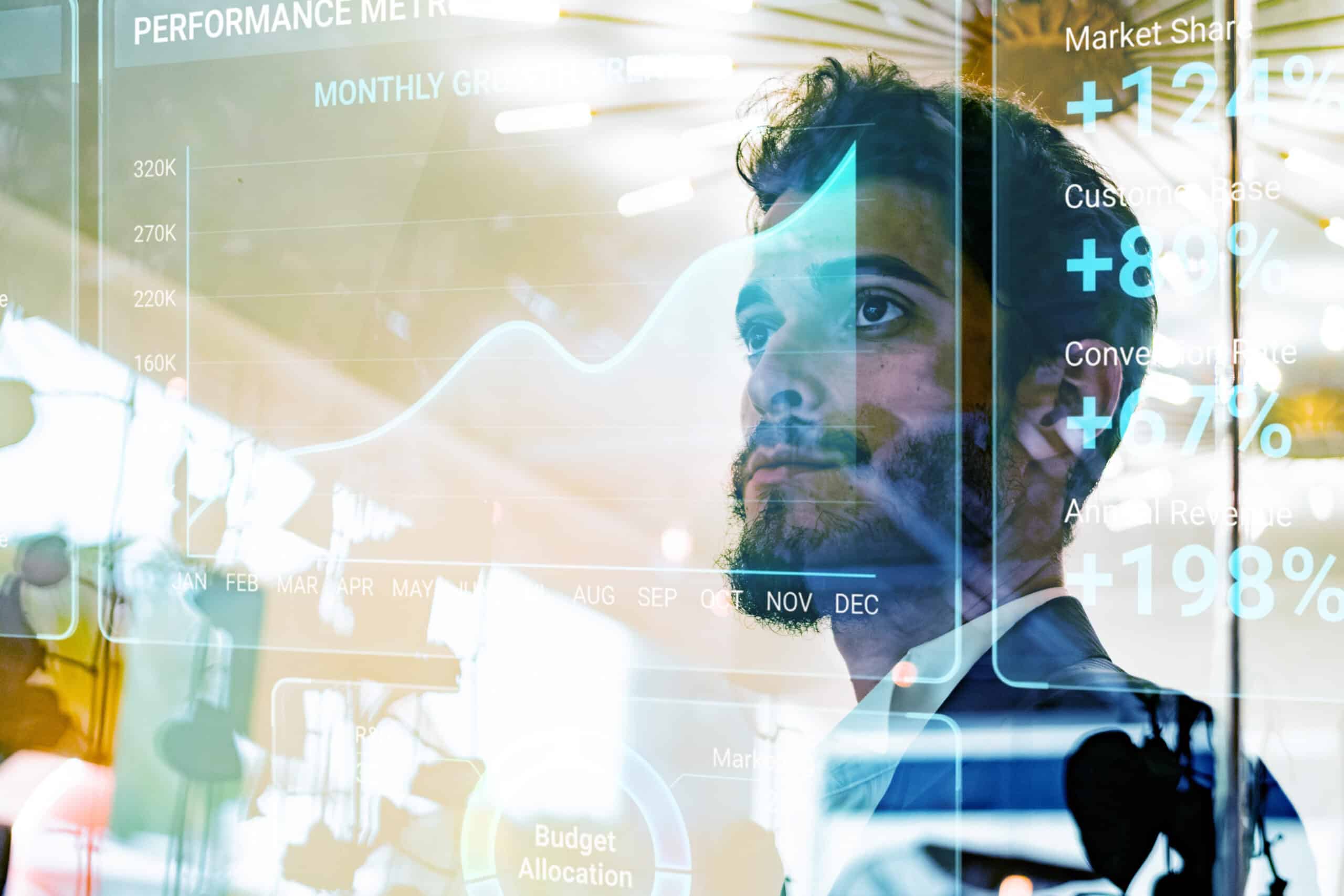 Businessman analyzing business data representing revenue strategy consulting