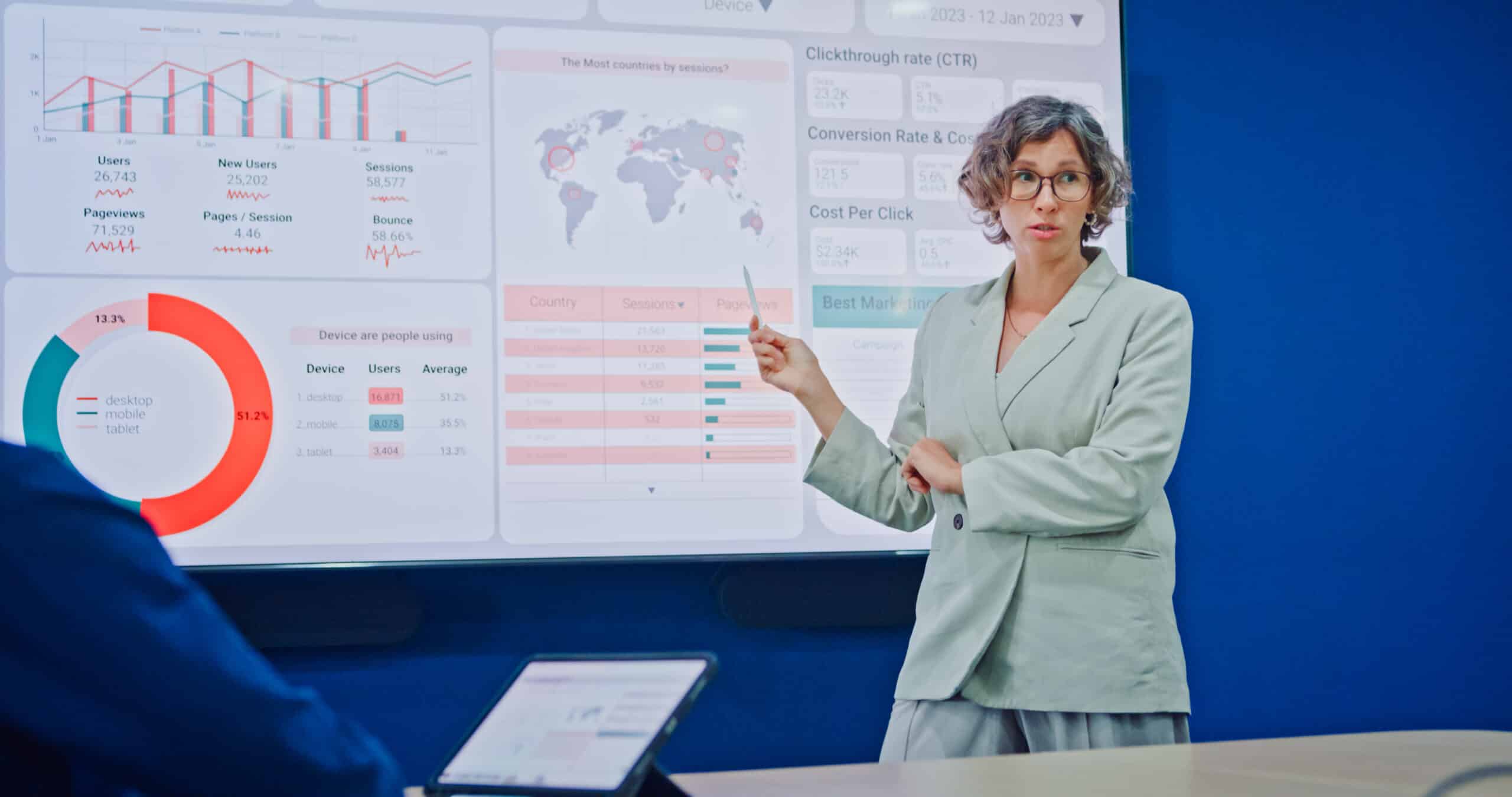 Diverse business team presents company data representing strategic partnerships consulting