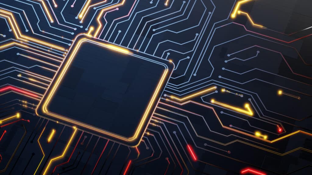 Glowing computer chip on a dark board, hinting at ai consulting for manufacturing innovation.