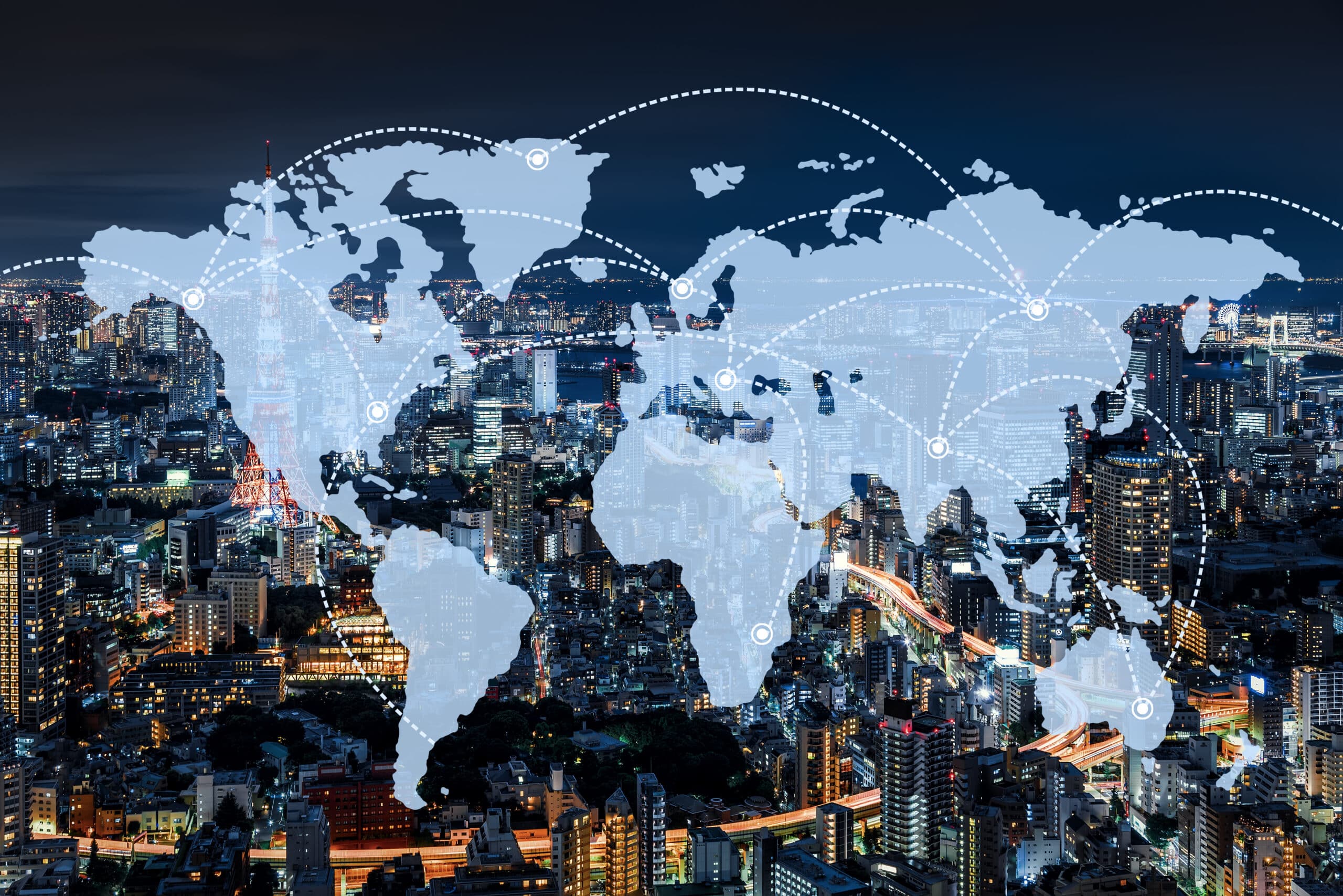 World map overlay on a cityscape at night, illustrating international expansion consulting.