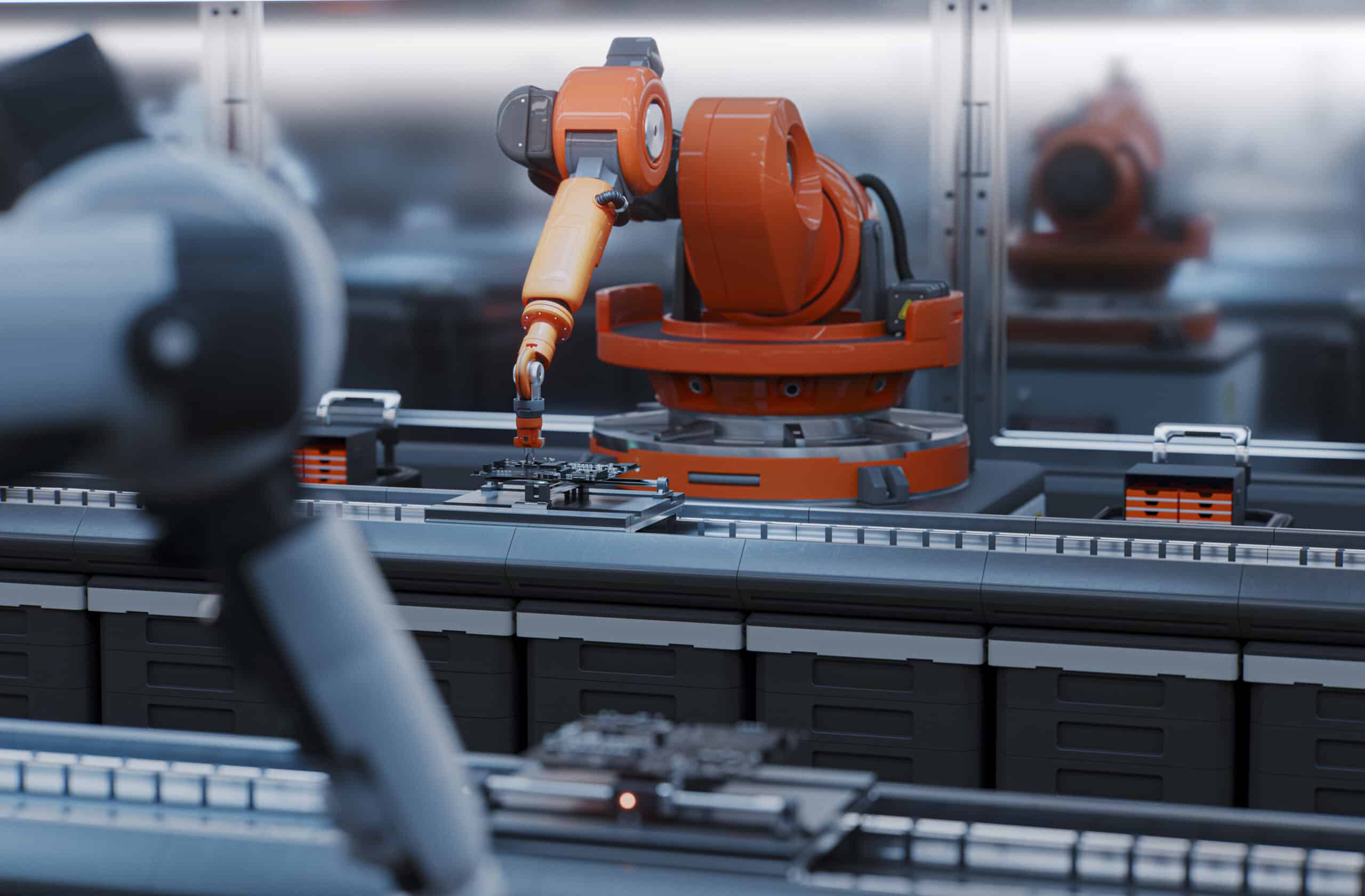 Orange robotic arm assembles components, showcasing manufacturing automation consulting expertise.