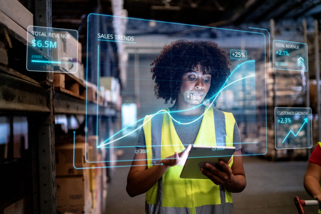 Warehouse worker visualizing smart infos representing S&OP Consulting