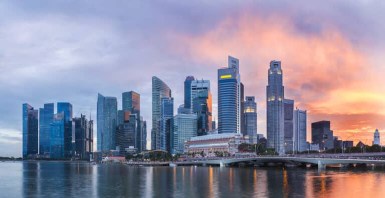 Singapore Marina Bay skyline at twilight for P&C Global Singapore office announcement at One Fullerton.